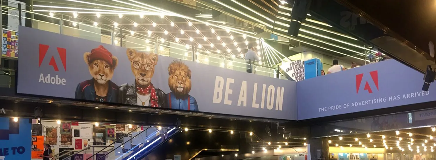 Adobe Be a Lion campaign featuring Zoo Portraits lion artwork at Cannes Lions